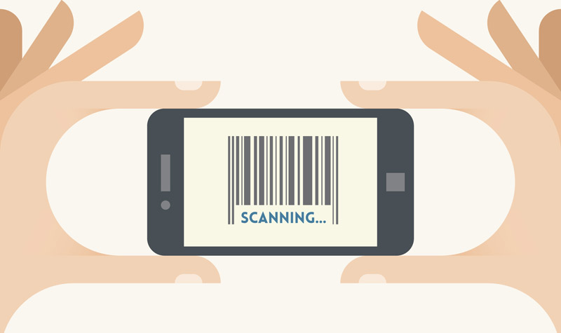 Woman holding barcode scanning app on phone